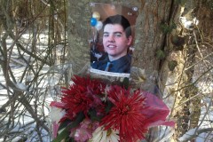 A memorial to Francis Duddy at the scene of a fatal car accident in Feb. 2014. (File Photo)