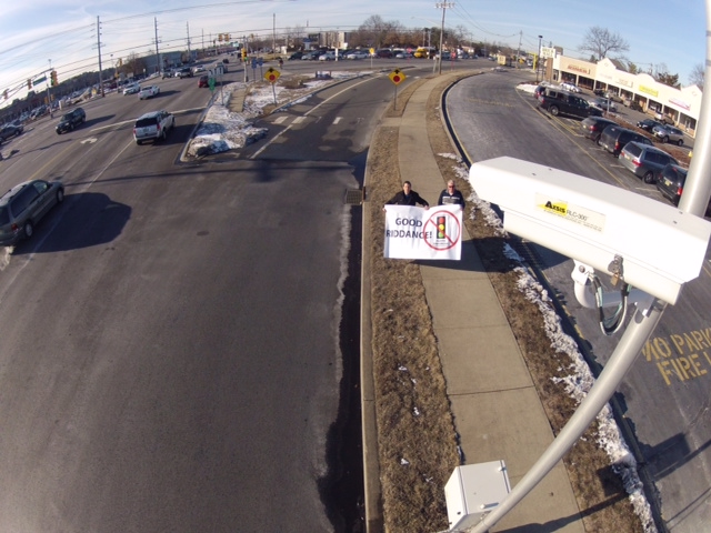 A "Good Riddance" sign displayed by Assemblyman Declan O'Scanlon at a Brick Boulevard intersection that formerly was equipped with red light cameras. (Photo: Declan O'Scanlon)