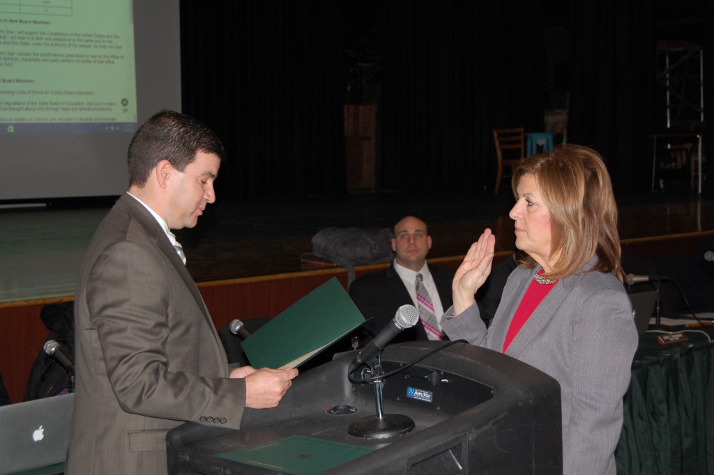 Sharon Cantillo is sworn in by Business Administrator James Edwards as Brick BOE President. (Photo: Daniel Nee)