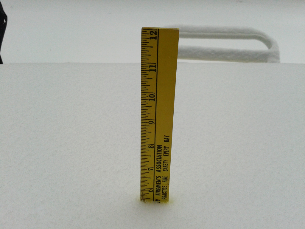 A ruler measuring snow in Brick's Herbertsville section late Tuesday morning. (Photo: Shorebeat)