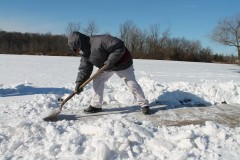 Shoveling snow. (Credit: Elvert Barnes/Flickr/File Photo)