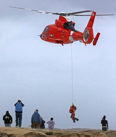 A man is rescued at Manasquan Inlet, Oct. 4, 2015. (Photo: Barnegat Bay Island/Facebook)