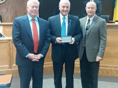 Chief Nils R. Bergquist receives a "Key to the Township" (Photo: Brick Township)