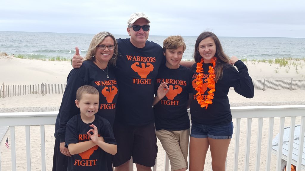 Family and friends of Matthew Dougard cheer on his flight over the ocean in Lavallette. (Photo: Kelly Dougard)