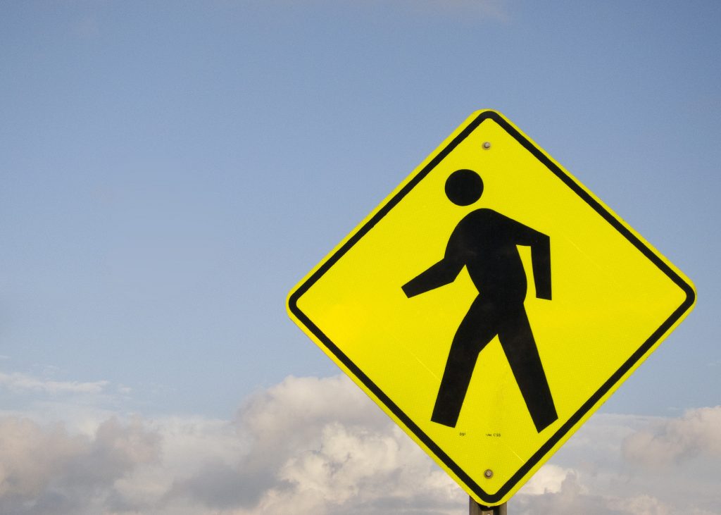 Crosswalk sign. (Credit: Robert Couse-Baker/Flickr)