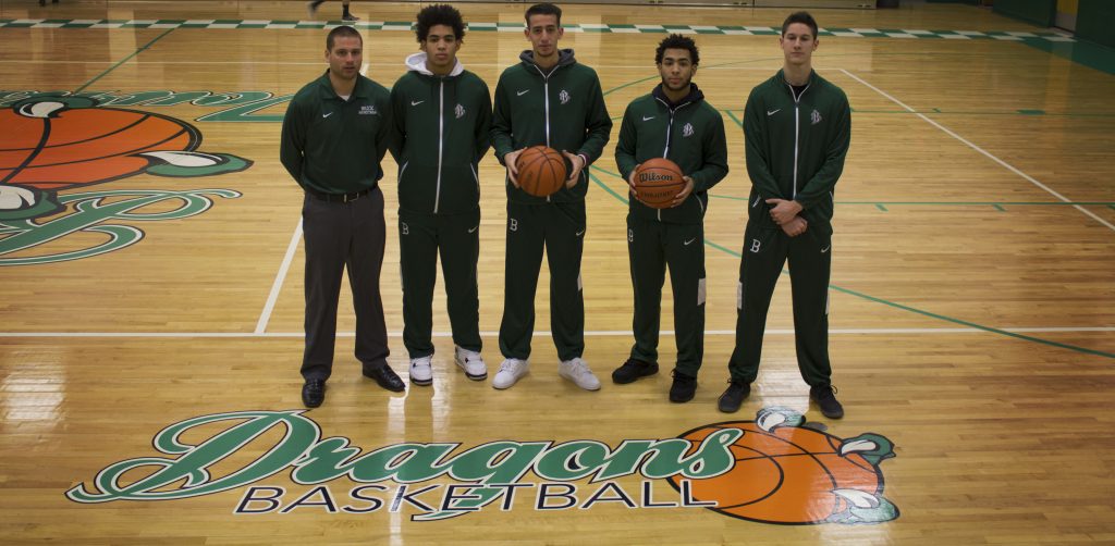 The Brick Township High School boys basketball team posted a winning record. From left to right are coach Mike Gawronski and four of the club's players--Shane Williams, Noah Buono, Brandon Williams and Anthony DeStefano. Photo credit: Luna Ortega