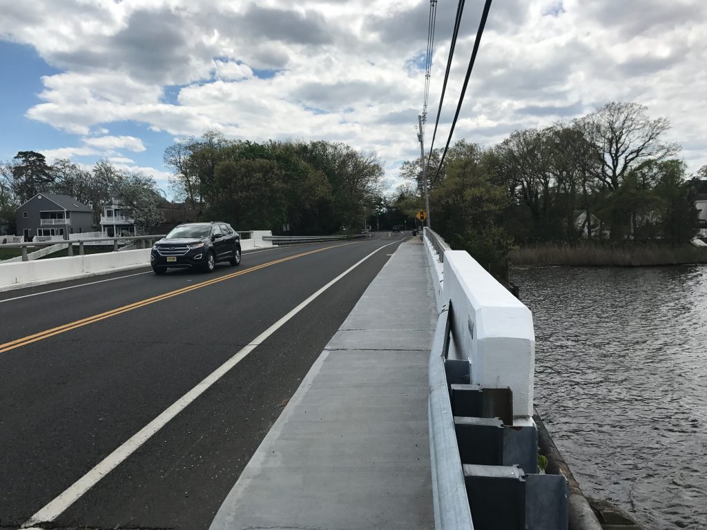 A vehicle traverses the Midstreams Bridge in Brick. (Photo: Daniel Nee)