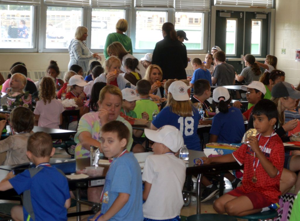 Students at Brick's BASE Camp program enjoying lunch provided by the Knights of Columbus Council 8160. (Photo: Daniel Nee)