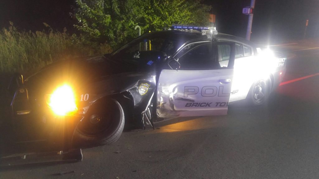 A Brick police car struck with an officer inside. (Photo: Brick Twp. Police)