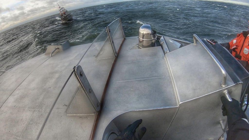 U.S. Coast Guard Station Manasquan Inlet members practice in heavy surf off Point Pleasant Beach. (Photo: USCG)
