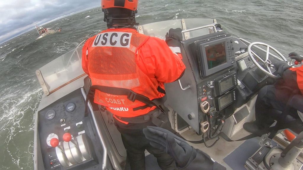 U.S. Coast Guard Station Manasquan Inlet members practice in heavy surf off Point Pleasant Beach. (Photo: USCG)