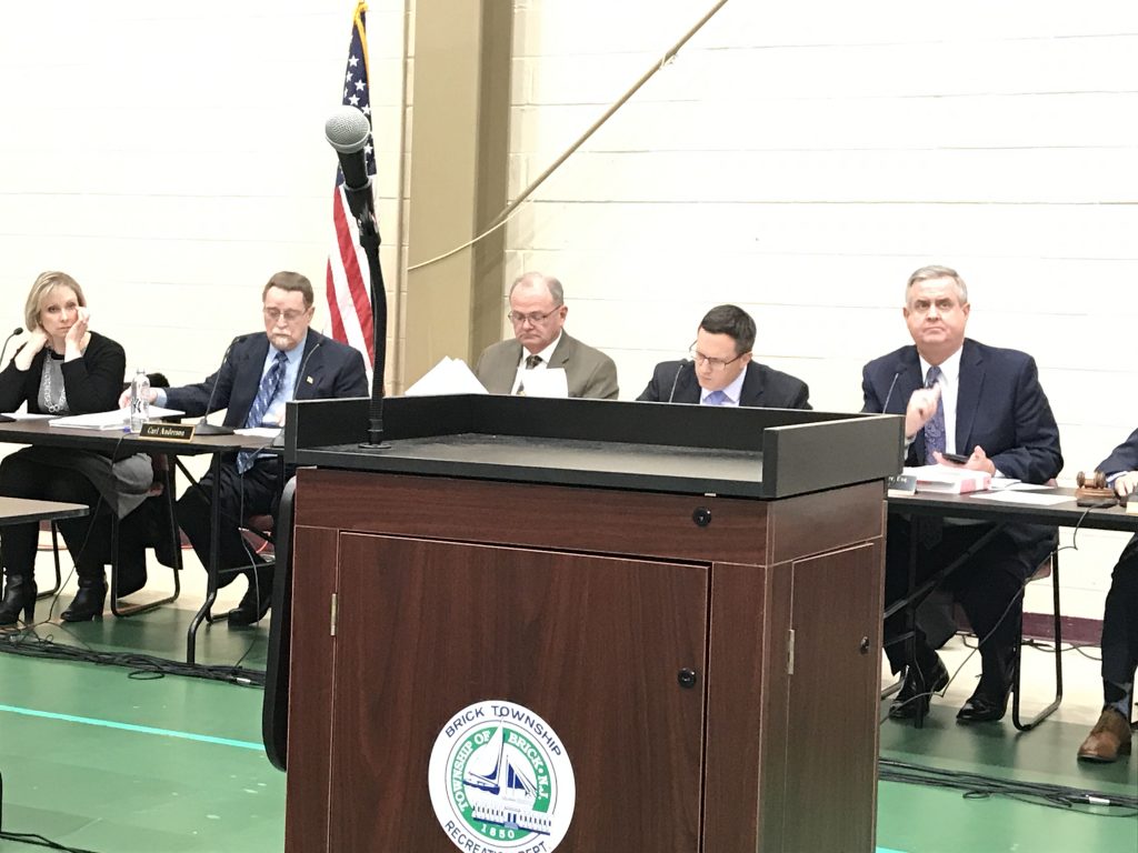 An empty lectern at the Jan. 9, 2019 Board of Adjustment meeting. (Photo: Daniel Nee)
