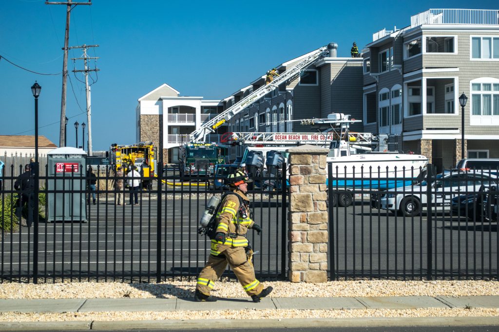 Firefighters respond to a four-alarm blaze at the Ocean Club condominium on Route 35 in Brick. (Photo: Daniel Nee)