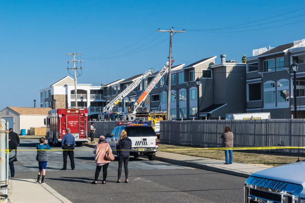Firefighters respond to a four-alarm blaze at the Ocean Club condominium on Route 35 in Brick. (Photo: Daniel Nee)