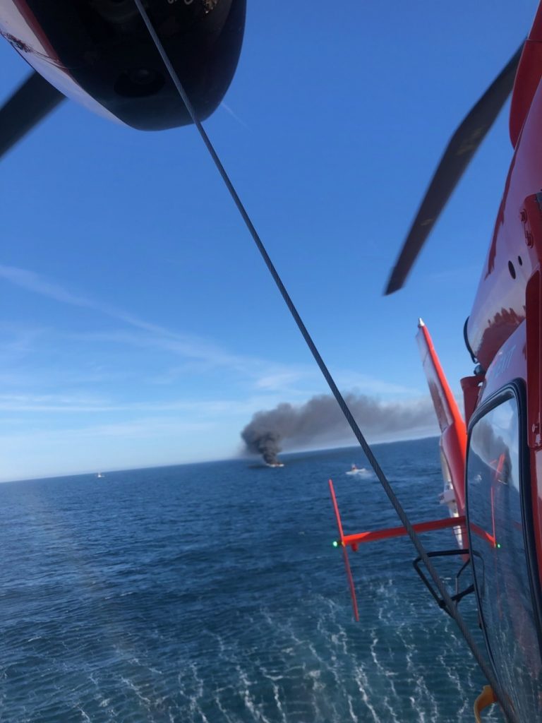 The U.S. Coast Guard rescues anglers from a burning boat off Ocean County, Nov. 5, 2020. (Photo: USCG)