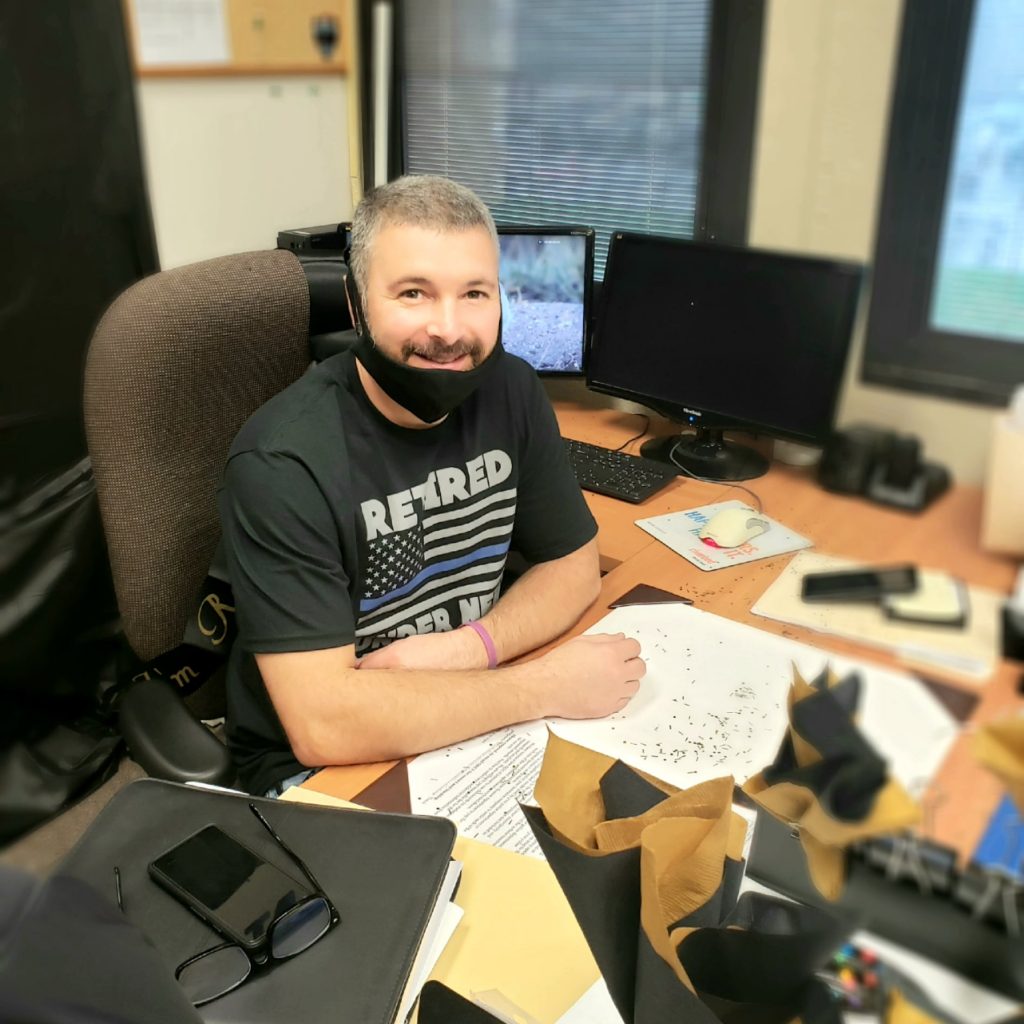 Lt. Joe Oliveri packs up his desk as he's ready to retire. (Photo: Brick Twp. Police)