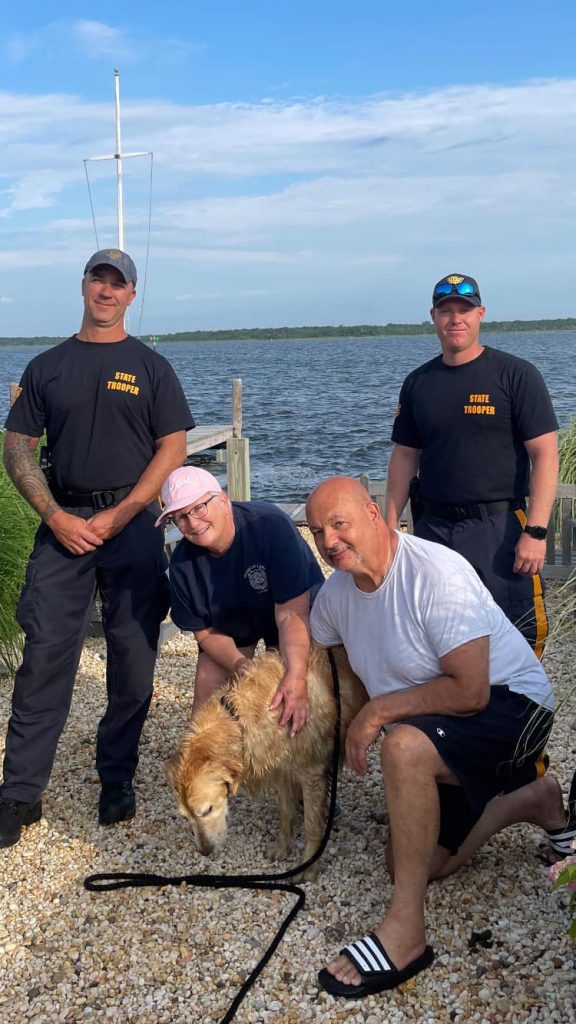 New Jersey state troopers with Chunk and his owners. (Photo: NJSP)