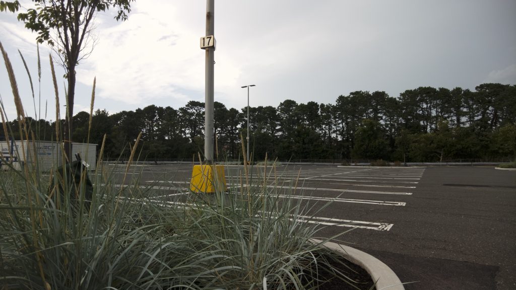 Empty parking spaces at the Laurel Square shopping center, Brick, N.J. (Photo: Daniel Nee)