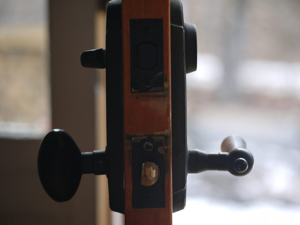 Front door and lock. (Credit: Rebecca Siegel/ Flickr)