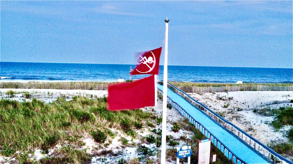 'Double red' flags fly at Brick Beach III, Sept. 2, 2023. (Photo: Shorebeat)