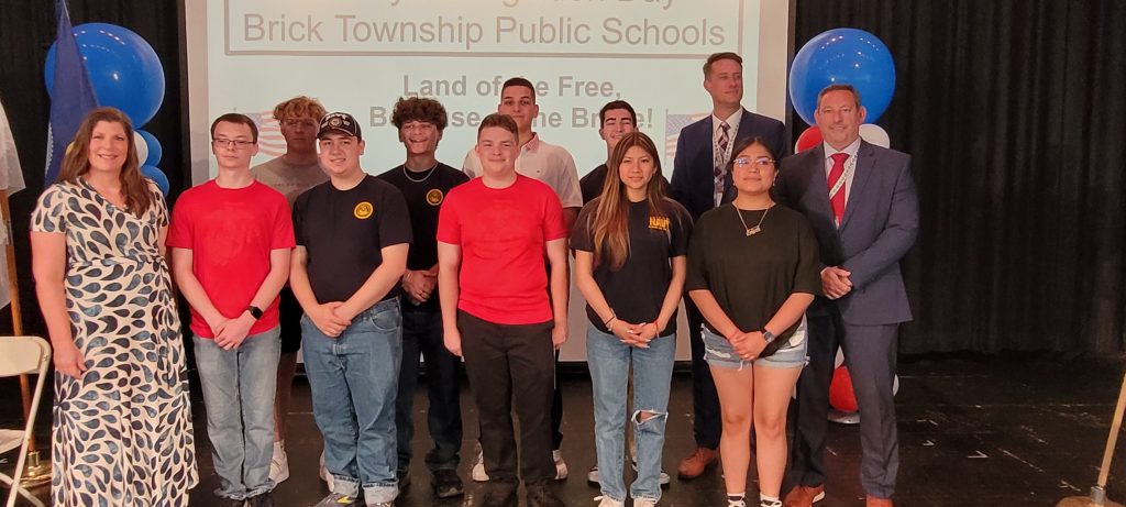 Mayor Lisa Crate and a group of Brick students about to begin their military service, May 2024. (Photo: Brick Township)