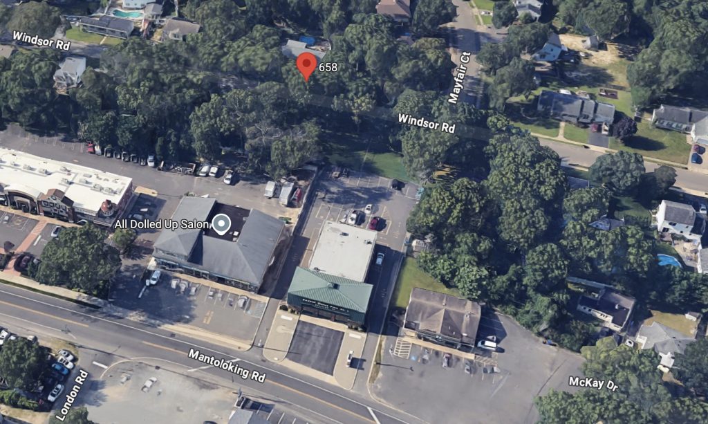 A parcel of land behind the Breton Woods firehouse (green roof) off Mantoloking Road. (Credit: Google Maps)